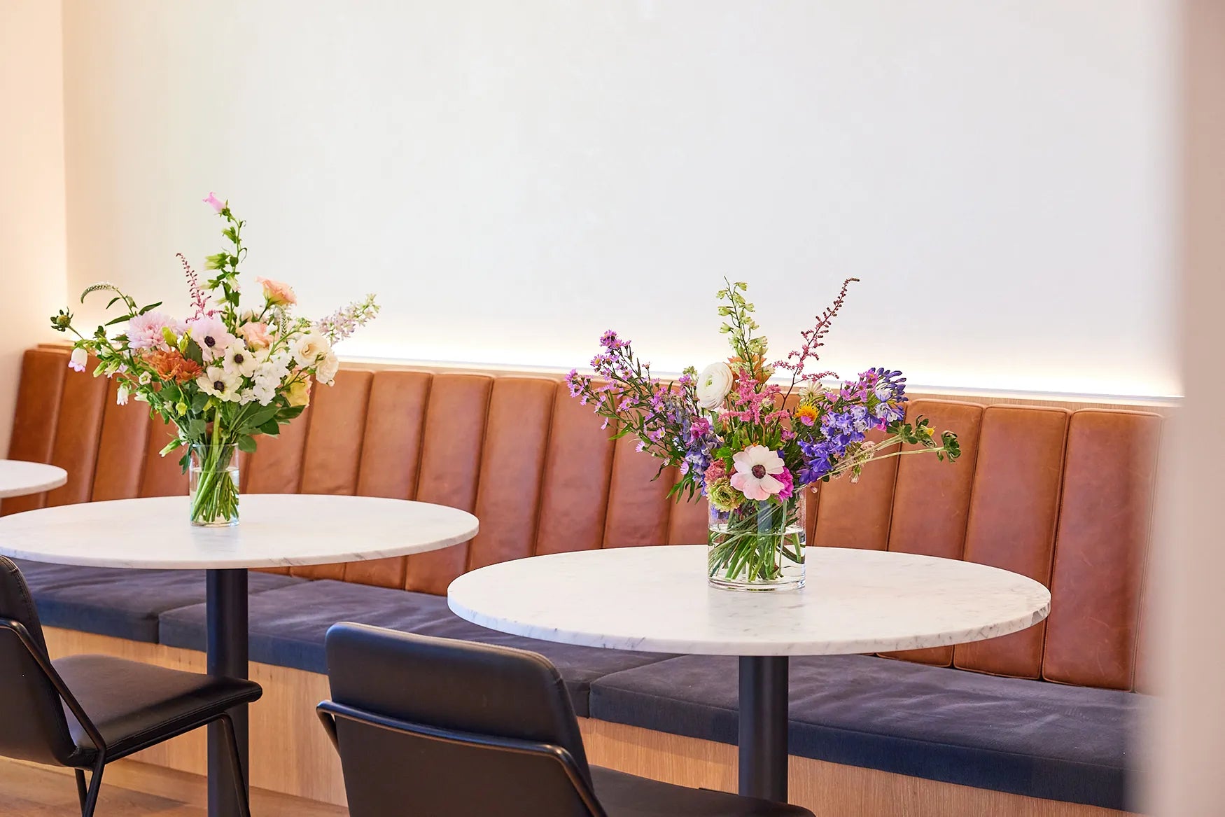 Floral arrangements add charm to café ambiance